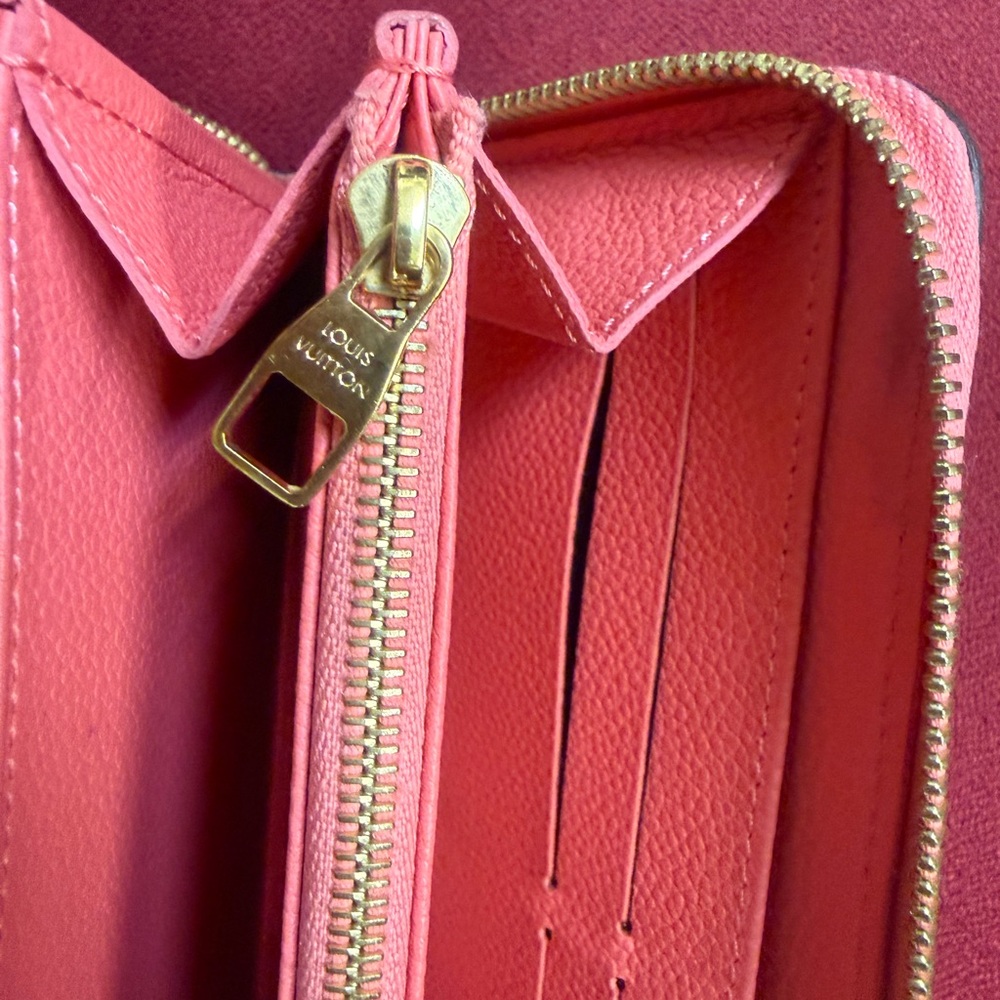 Authenticated Louis Vuitton Pink/Coral Monogram Empreinte Zippy Leather Wallet - Picture 9 of 16